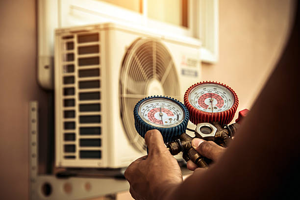 Professional Hvac technician working in Tateville, KY